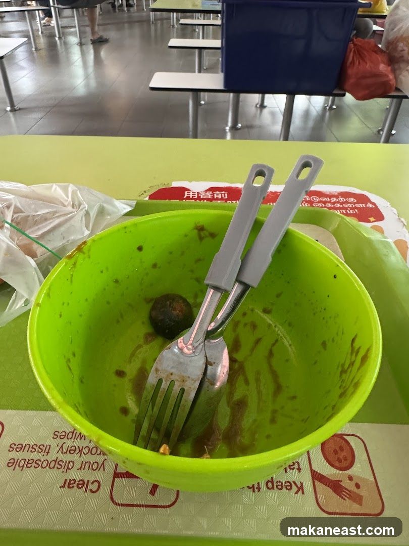 Dirty Bowl with Utensils
