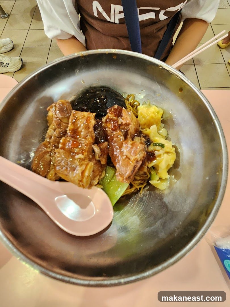 Bowl of Noodles with Pork and Wontons