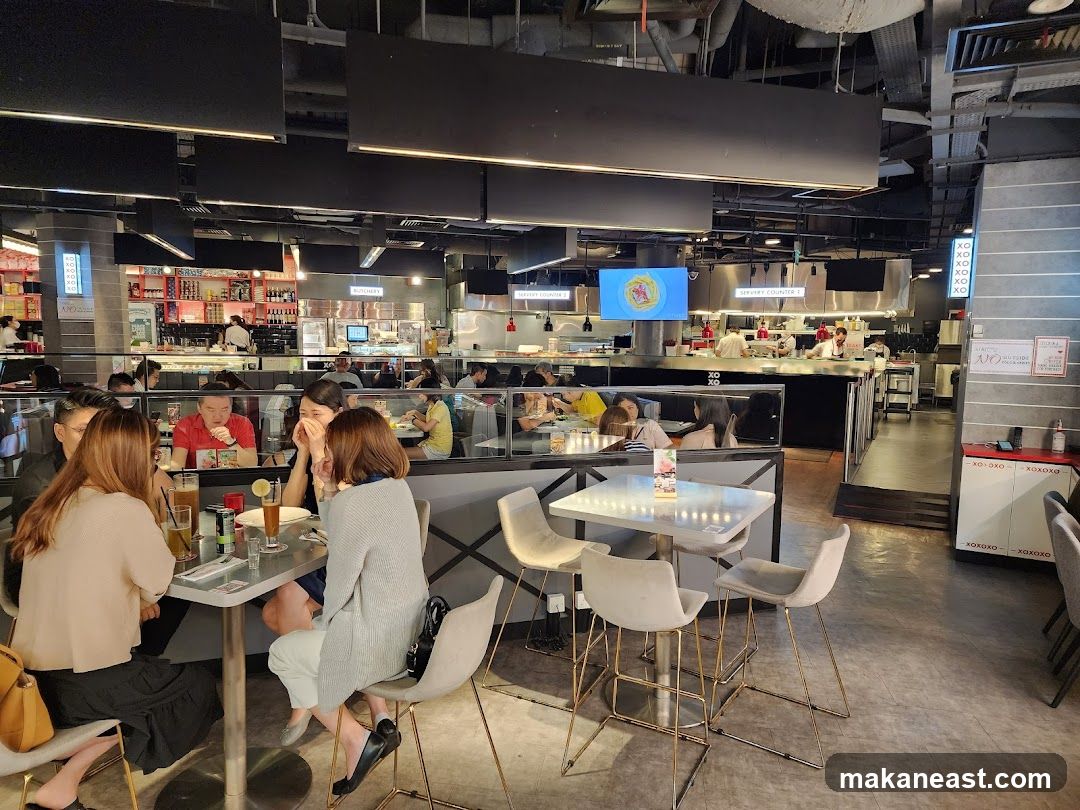 Restaurant Interior with Diners and Open Kitchen