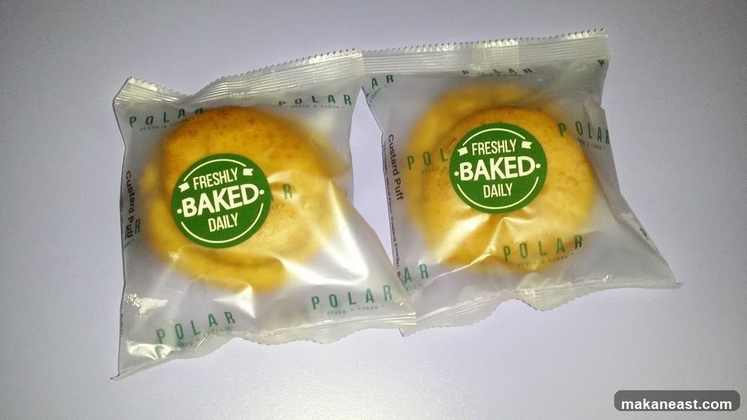 Two individually packaged custard puffs