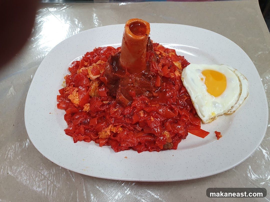 Spicy Noodle Dish with Bone Marrow and Fried Egg