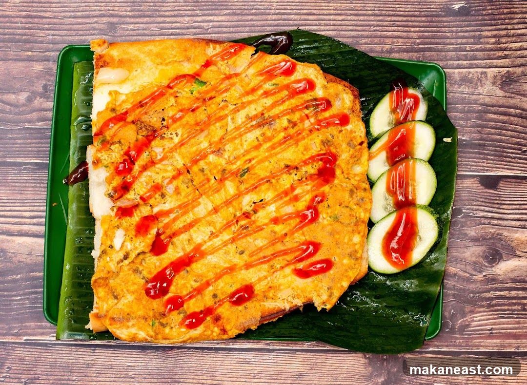 Omelette with Ketchup and Cucumber Slices