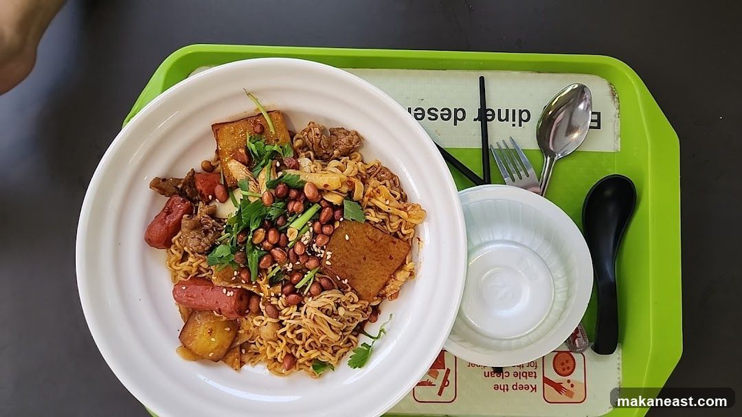 Noodle Dish with Peanuts and Sausage