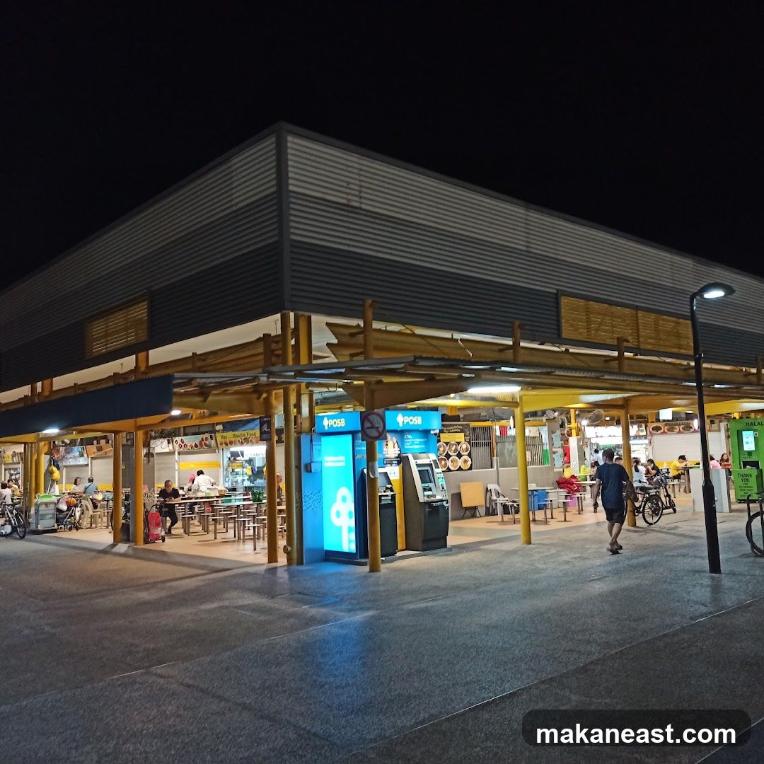 Night view of a food court with ATMs