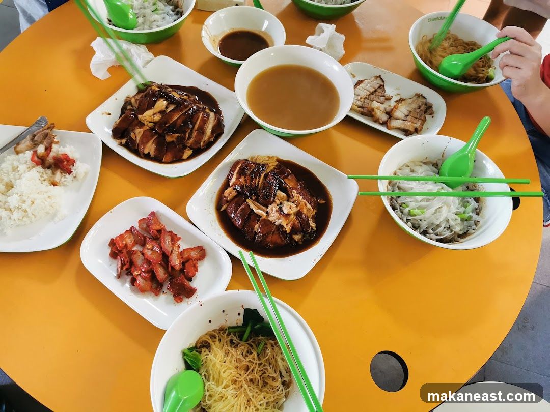 Table with various dishes of food