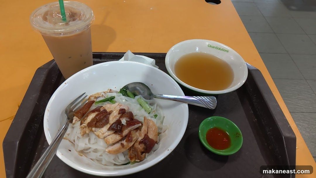Chicken noodle dish with iced coffee