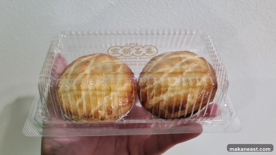 Two Pastries in a Plastic Container