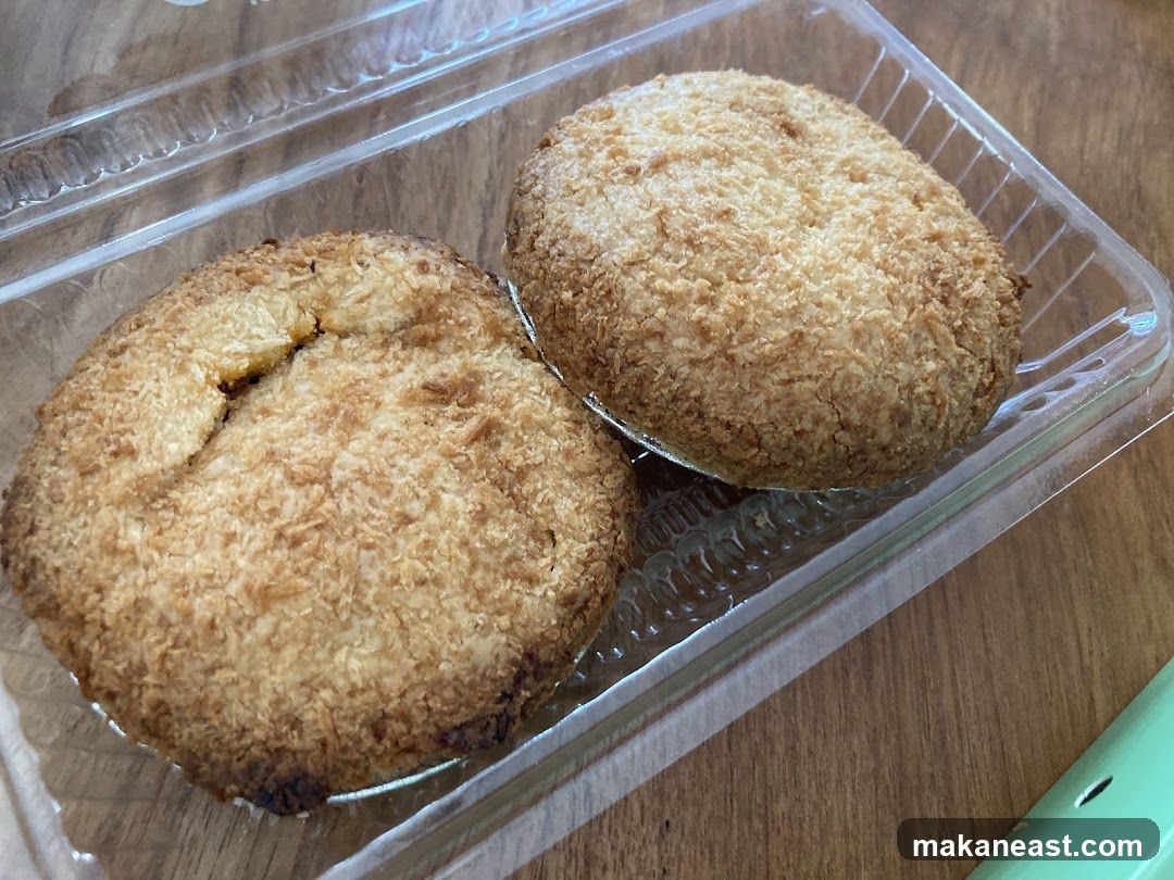 Two Croquettes in a Plastic Container