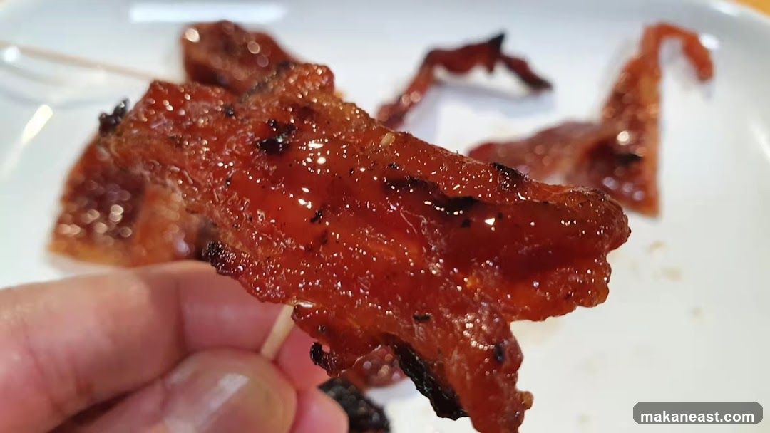 Close-up of glazed meat on a skewer