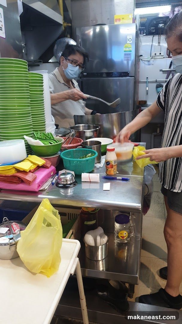 Kitchen Staff Preparing Food