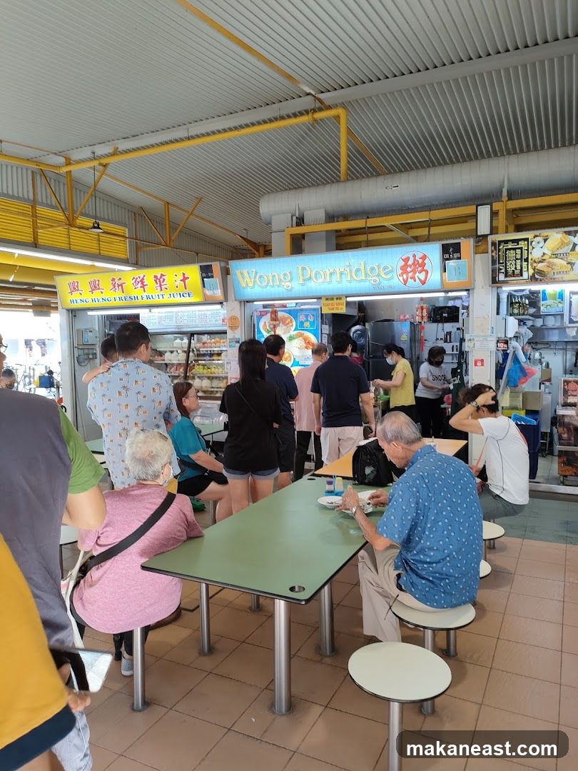 People eating at a food stall
