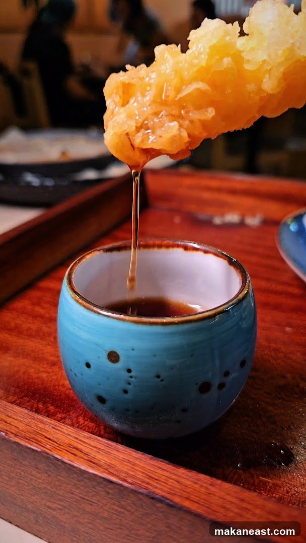 Dipping Tempura in Sauce