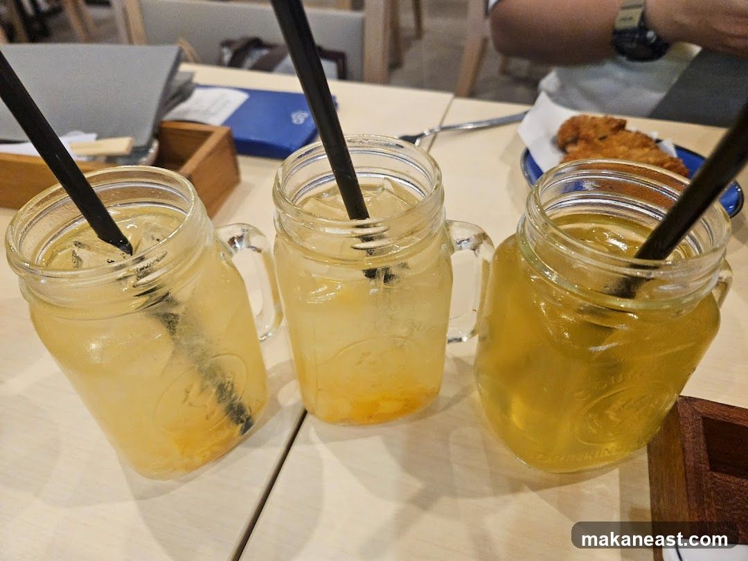 Three drinks with straws
