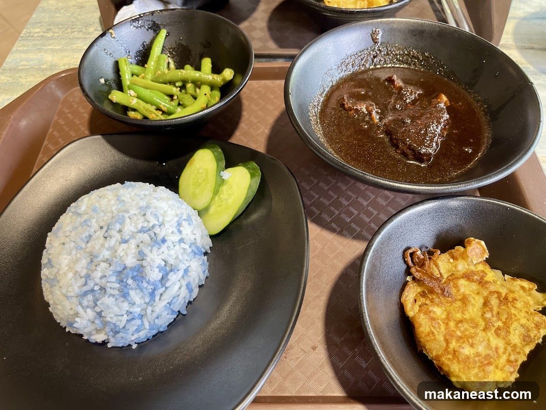 Meal with Rice, Beef Stew, Green Beans, and Omelet