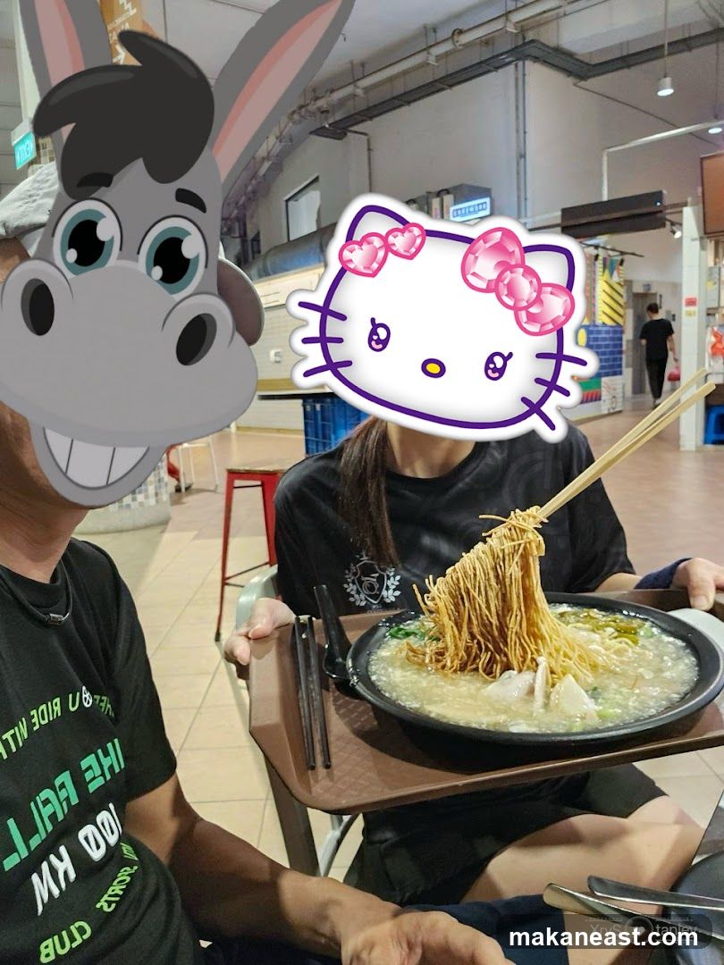 People eating noodles
