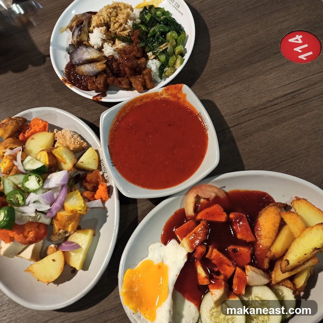 Three plates of food on a table