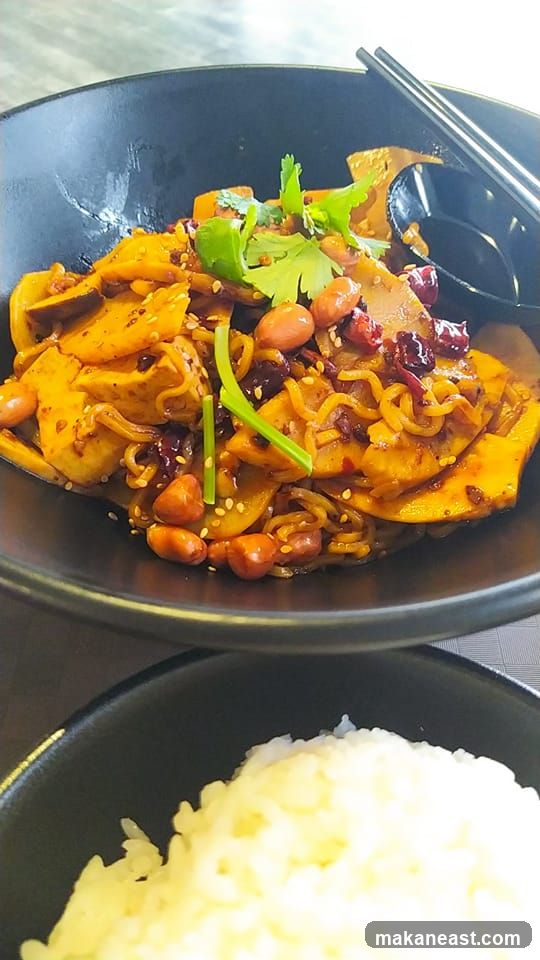 Spicy Noodle Dish with Peanuts and Cilantro