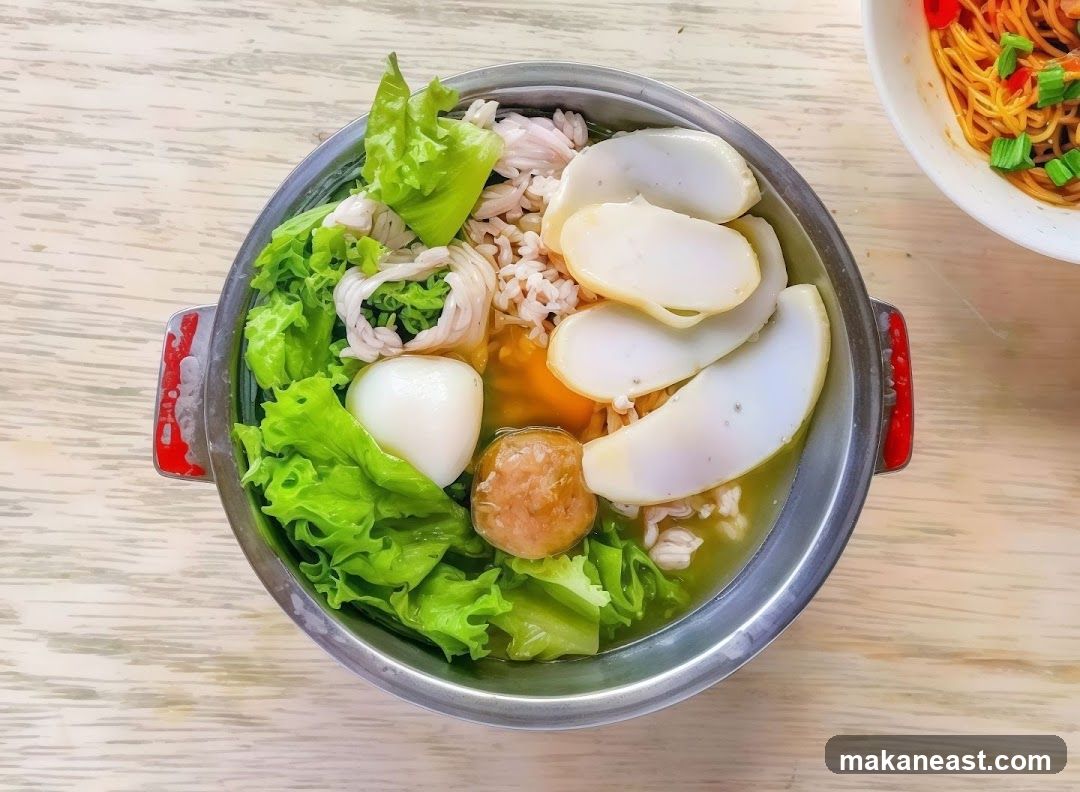 Noodle Soup with Fish Cakes and Vegetables