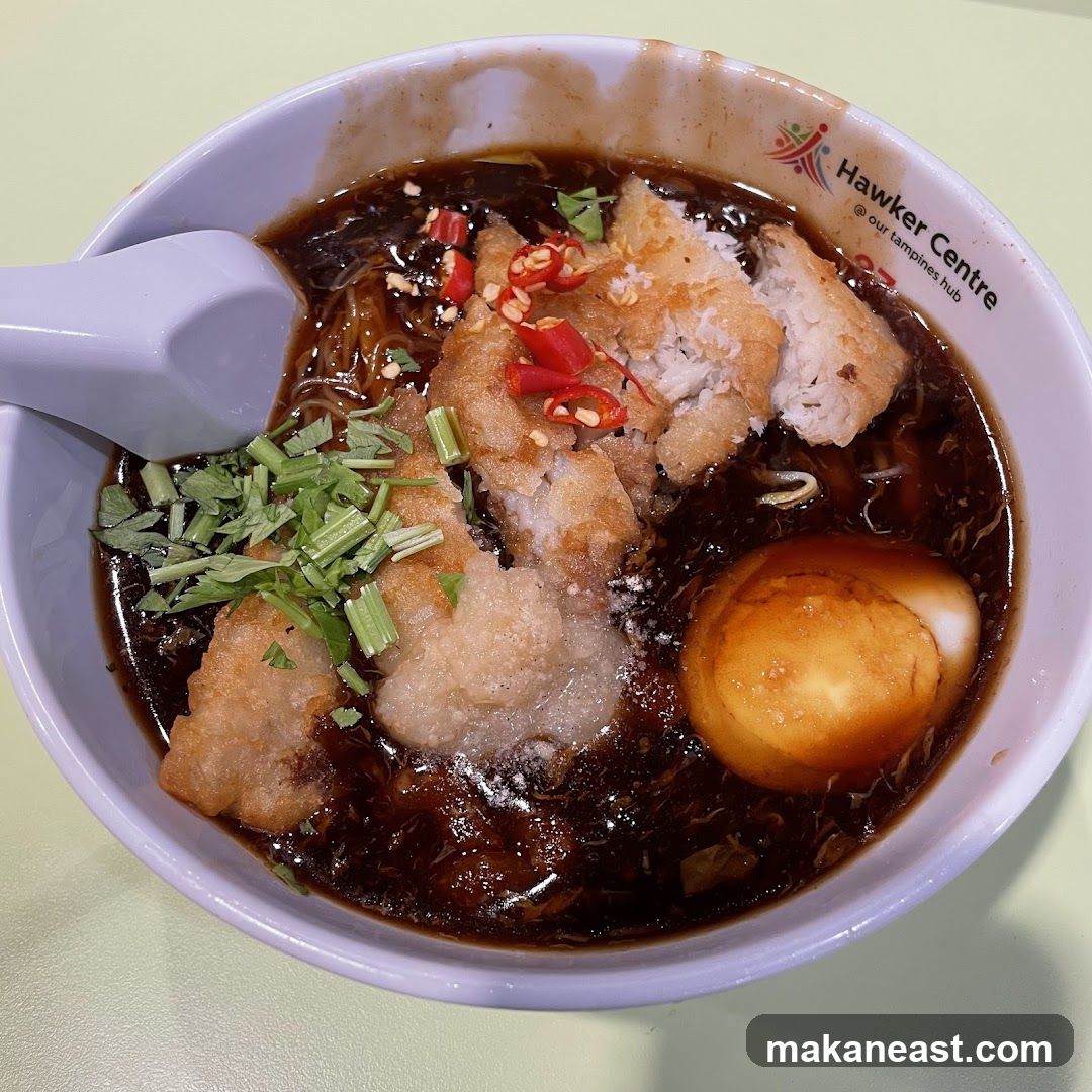Bowl of Noodles with Fried Fish and Egg