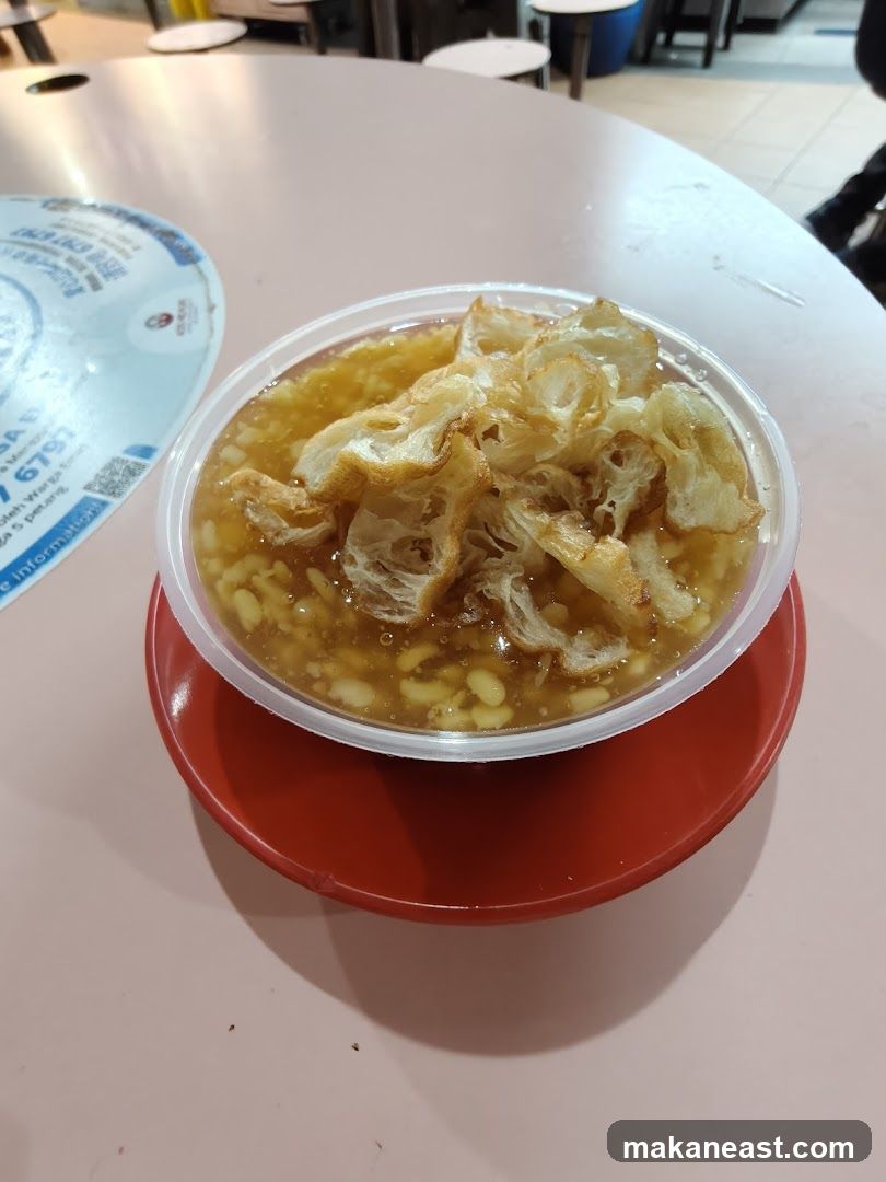 Bowl of food with fried dough