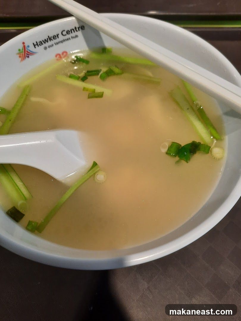 Soup with Chopsticks and Spoon