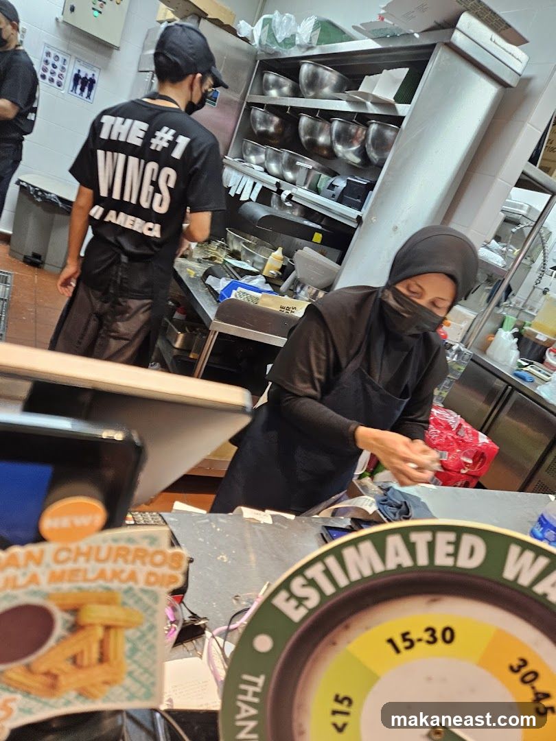 Kitchen Staff Preparing Food