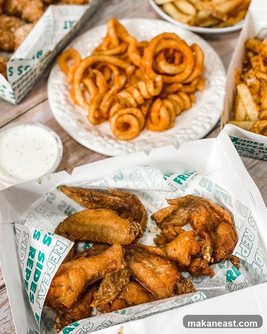 Fried Chicken Wings and Curly Fries