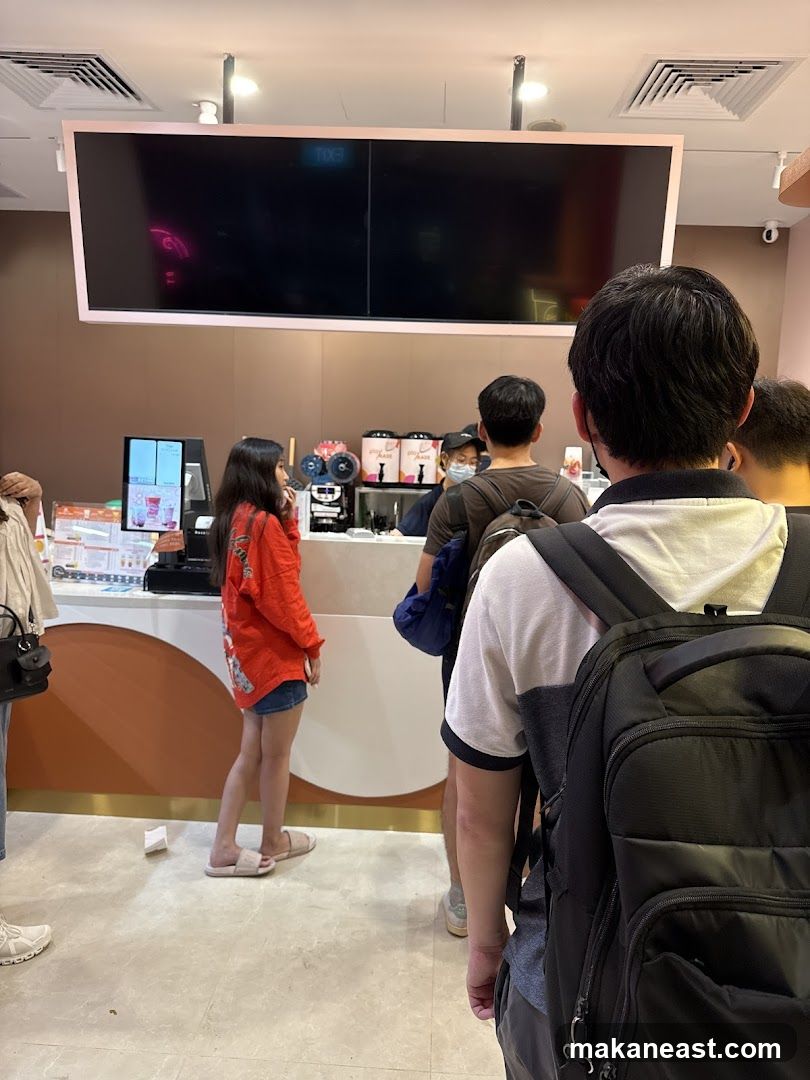 People in line at a beverage shop