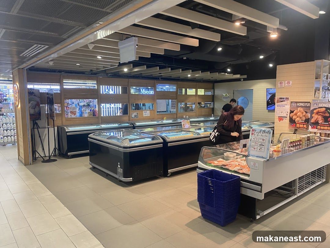 Supermarket Interior with Frozen Goods and Fresh Produce