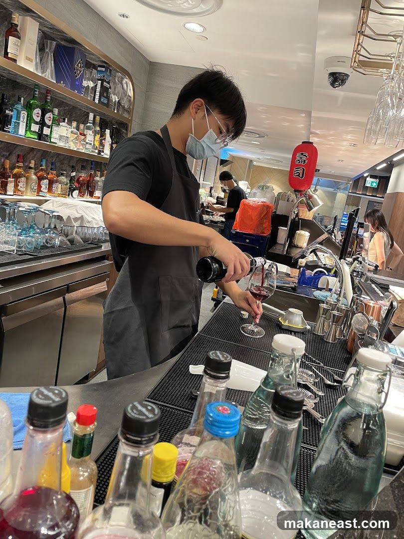 Bartender pouring wine