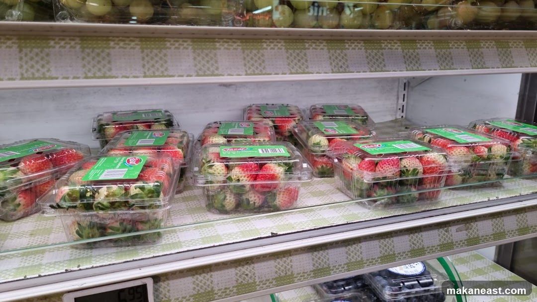 Strawberries and other fruits on display