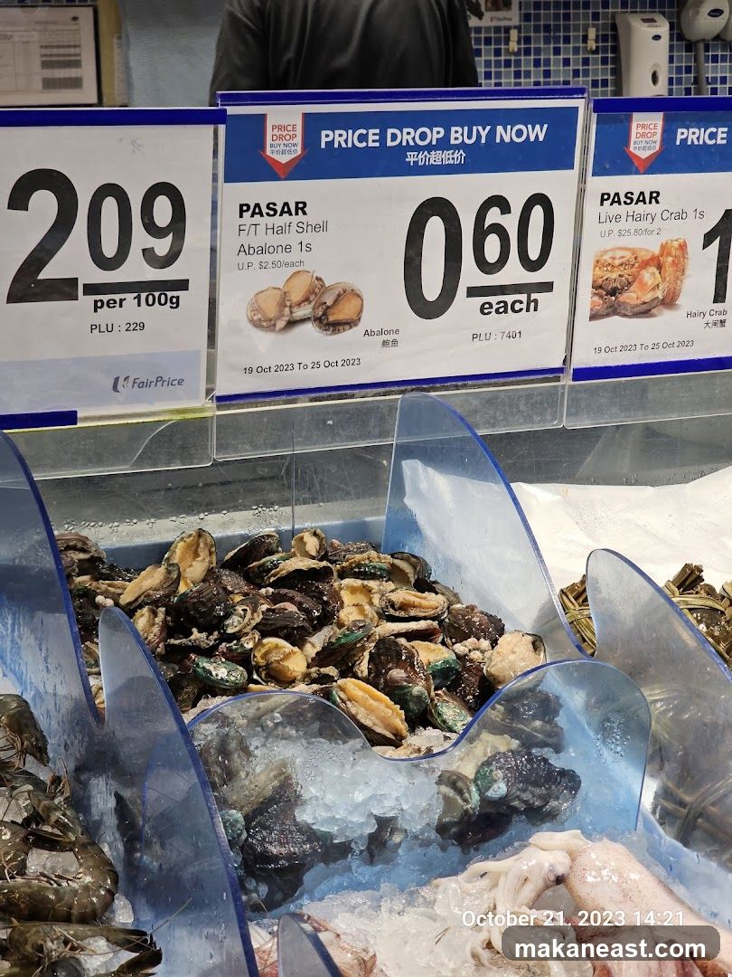 Seafood Display with Price Drop Signs