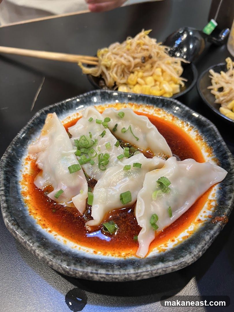 Dumplings with Chili Oil and Side of Sprouts