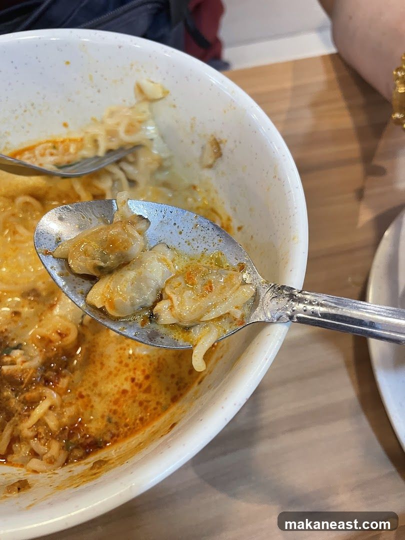 Close-up of a Spoonful of Noodles and Clams
