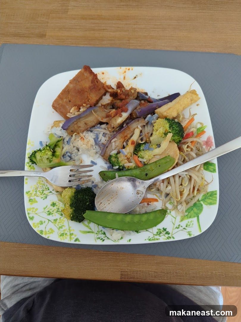 Plate of food with rice and vegetables