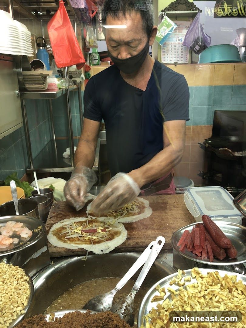 Street food vendor preparing crepes