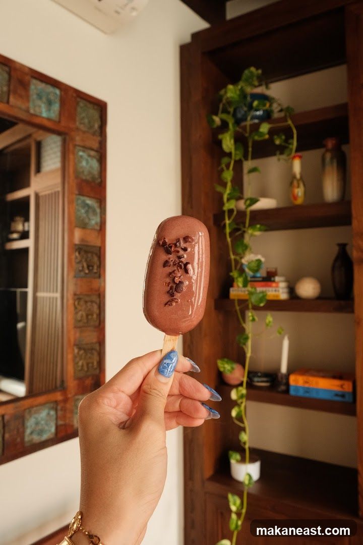 Chocolate popsicle with cacao nibs