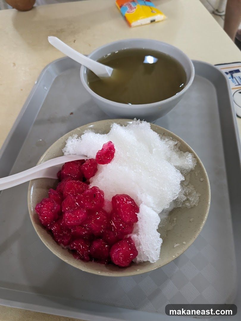Dessert with shaved ice and red jelly