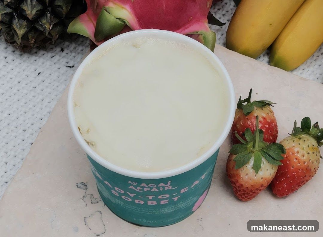 A cup of sorbet with fruit