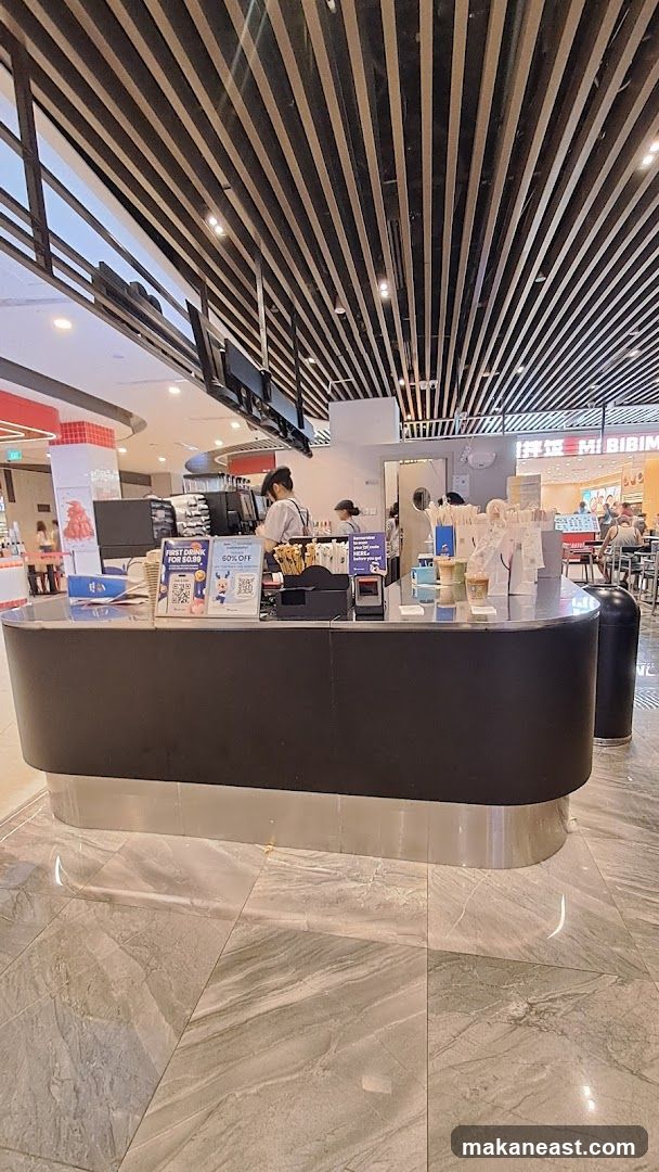 Counter with drinks and promotional signs