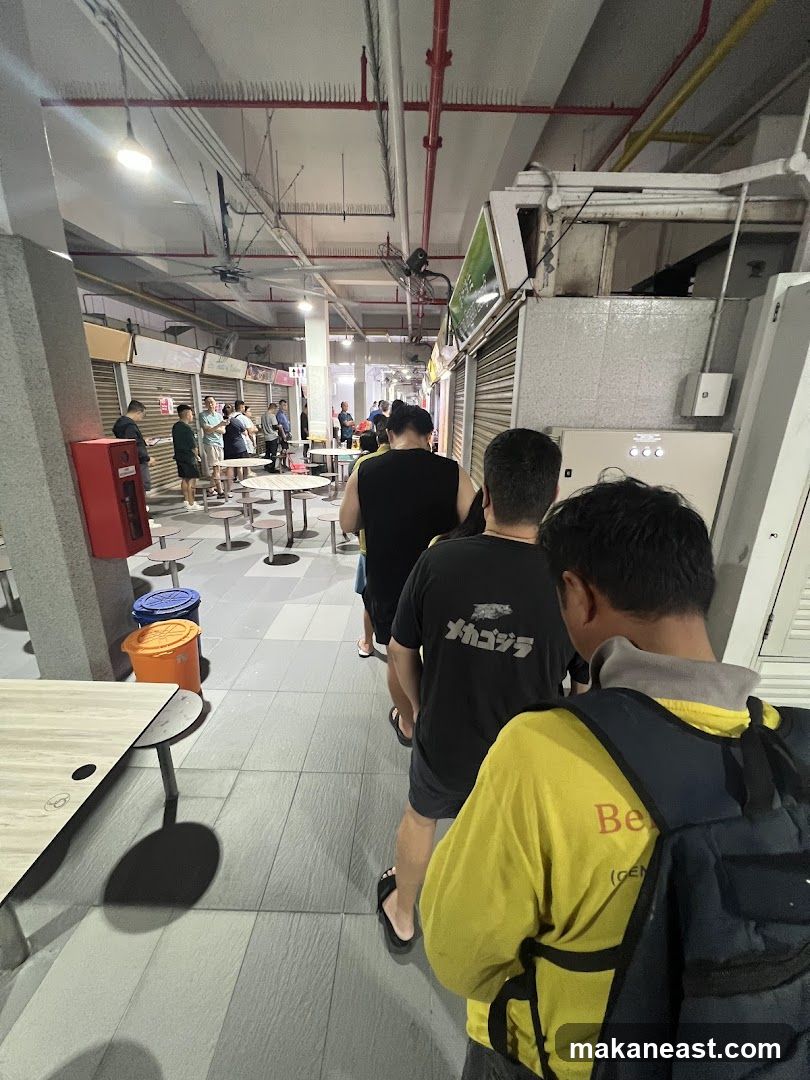 People queuing at food stalls