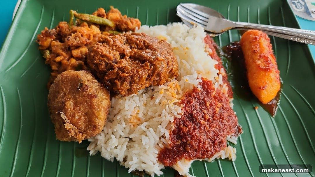 Plate of Rice with Various Toppings