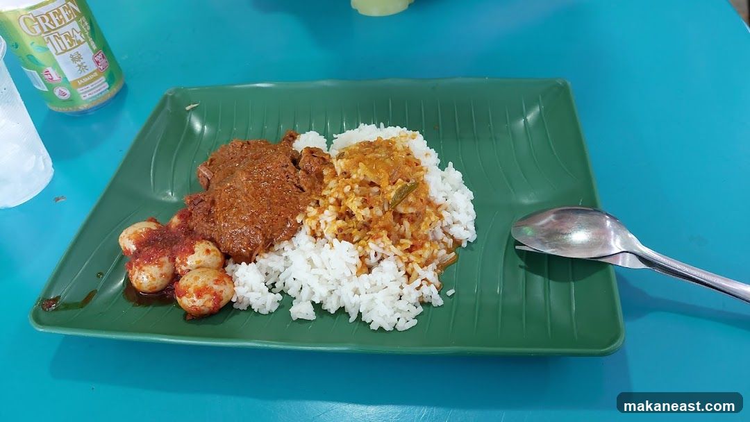 Rice dish with meat and quail eggs