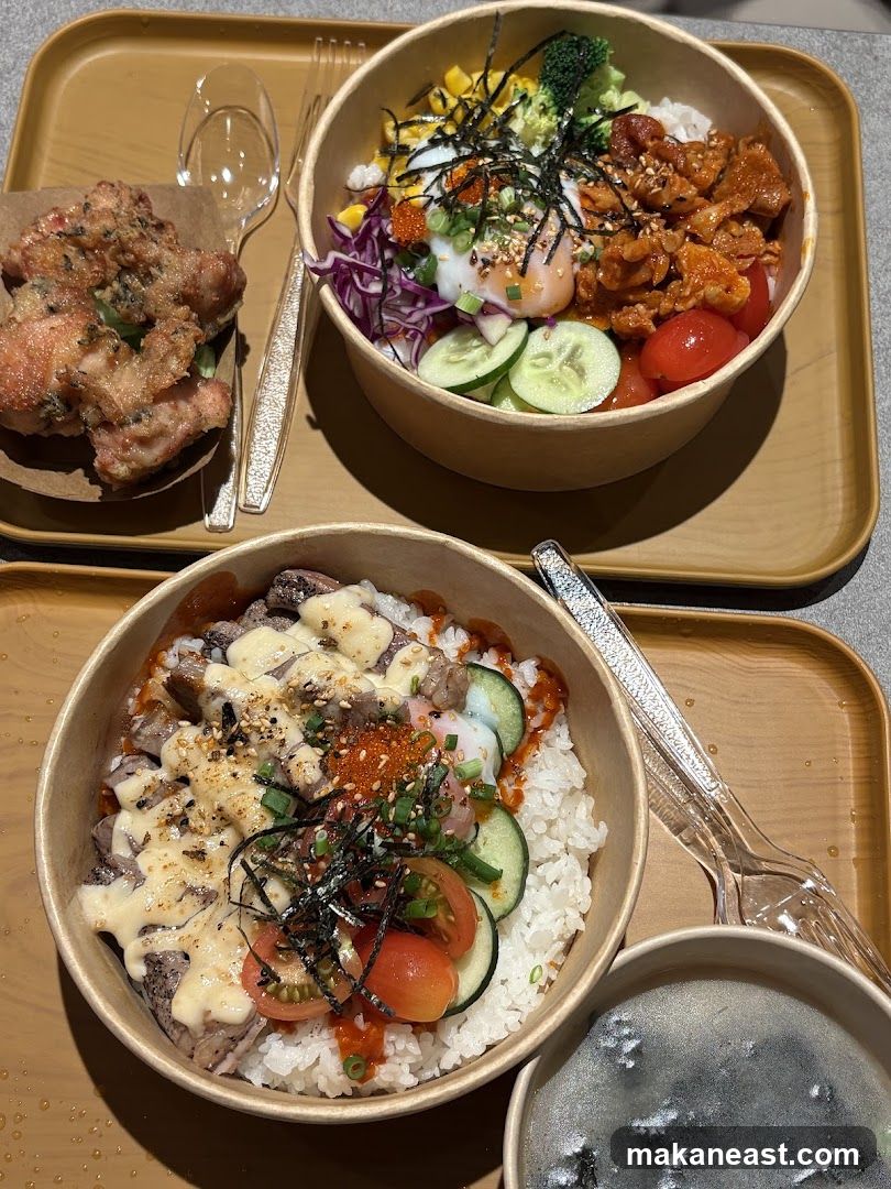 Two rice bowls and fried chicken