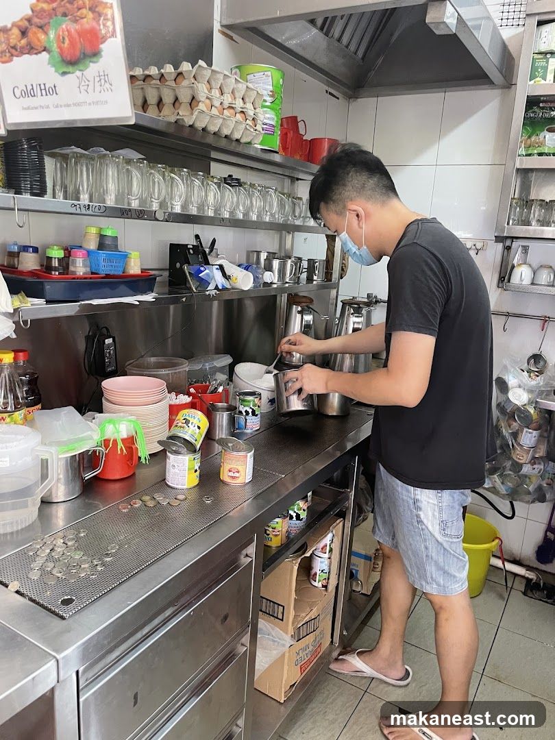 Man preparing drinks in a kitchen