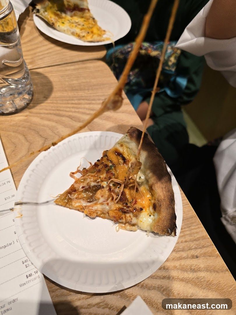 Pizza Slice with Stretched Cheese