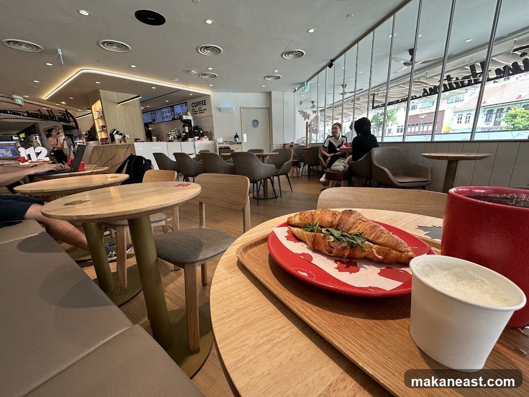 Croissant and Drink at a Cafe