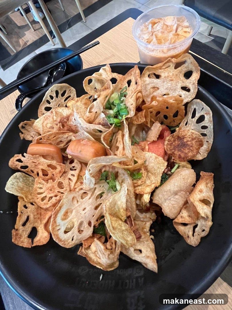 Fried Lotus Root and Sausage Dish