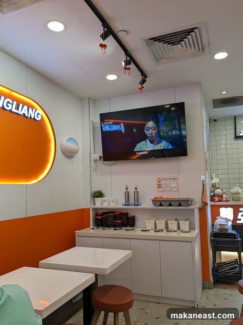 Restaurant Interior with TV and Tables