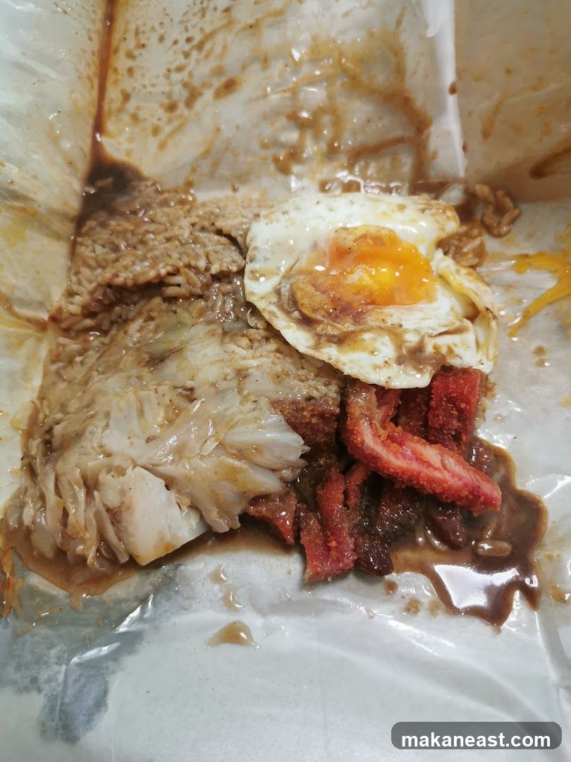 Rice dish with fried egg and meat